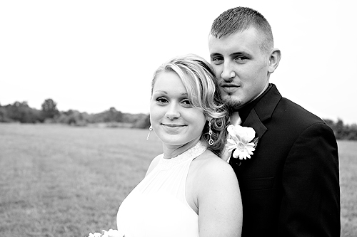 black and white portrait of bride and groom in vineyard