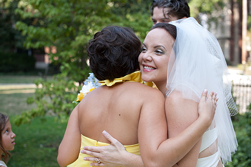 bride hugging bridesmaid