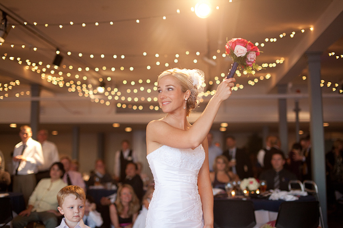 bride tossing bouquet